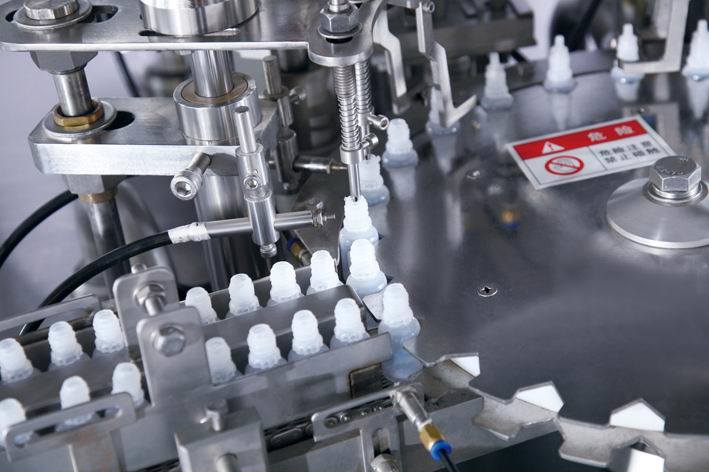 Venta caliente botella de vidrio de cigarrillo electrónico máquina tapadora de llenado de líquidos