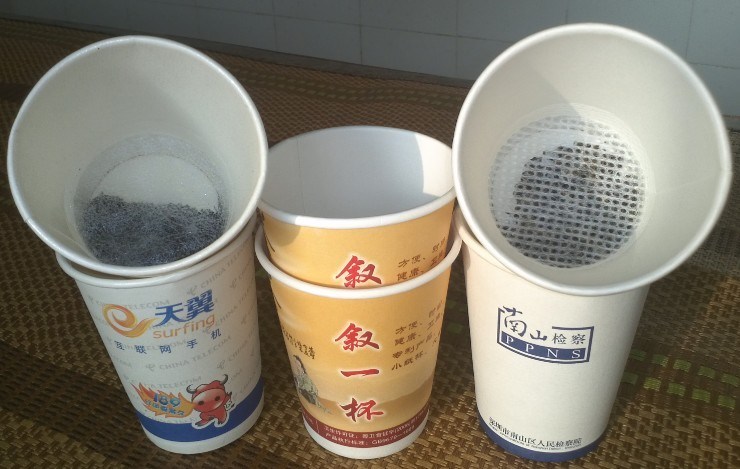 Máquina de envasado de llenado oculto de taza de té de filtro de trabajo manual para 2 cabezas