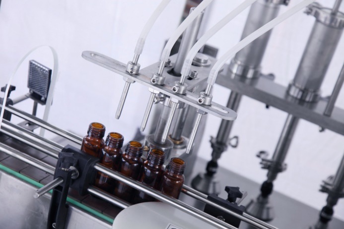 Máquina de sellado de llenado de líquido de bomba de pistón de botella de jarabe líquido oral (30-60 ml)