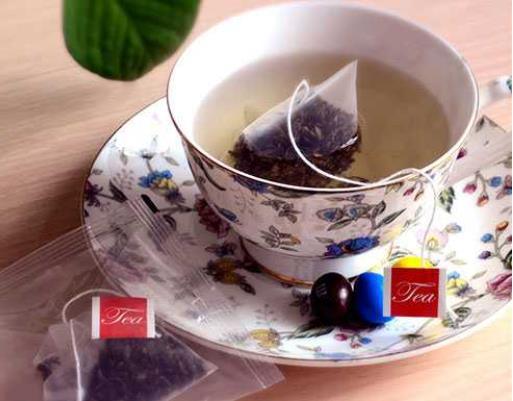 Dxdc50 té de hierbas / té verde / té negro / máquina de envasado de té de pirámide de especias de alimentos / máquina de envasado de bolsas de té de pirámide