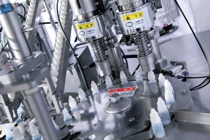 Venta caliente botella de vidrio de cigarrillo electrónico máquina tapadora de llenado de líquidos